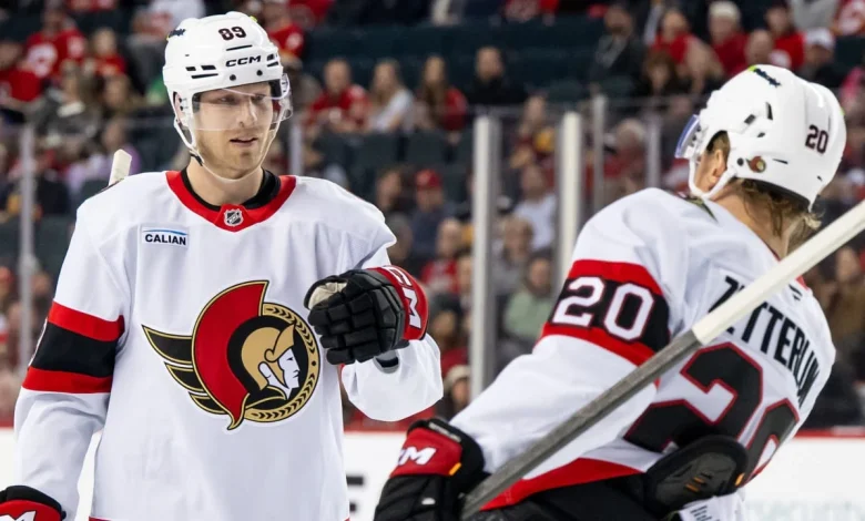 Senators score 3 in 3rd, defeat Flames to push point streak to 5