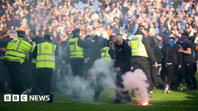 'Shameful' pitch invasion by Celtic and Rangers fans condemned by police