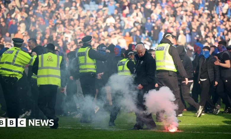 'Shameful' pitch invasion by Celtic and Rangers fans condemned by police