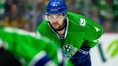 Sharks acquire Jett Woo from Canucks for Jack Thompson