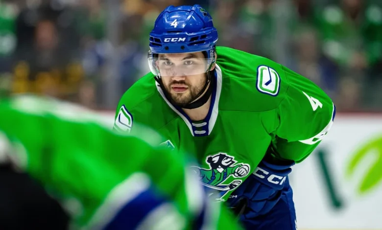 Sharks acquire Jett Woo from Canucks for Jack Thompson