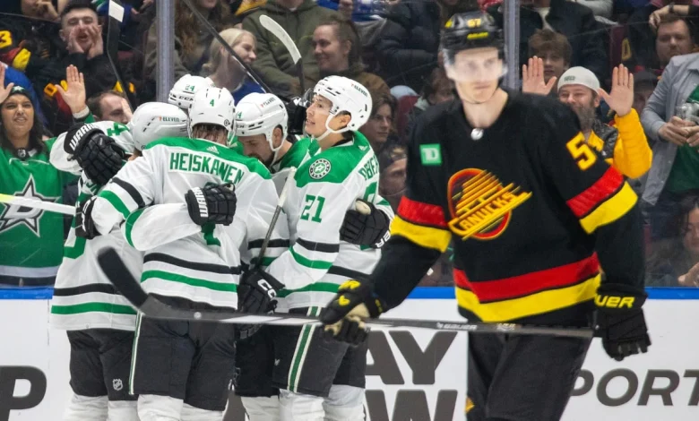 Stars score 6 straight, defeat Canucks for franchise-record 9th win in row