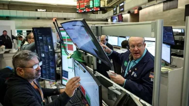 Stocks close down as oil spikes 12%, job market weakens