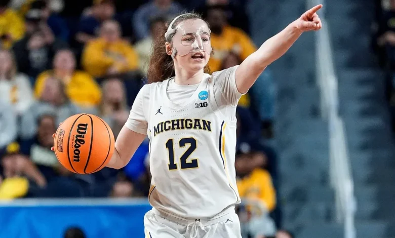 This Michigan player still wears a mask, even after her broken nose healed. Here's why