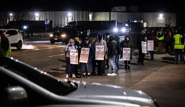Thousands of meatpacking workers walk off job in first strike in 40 years