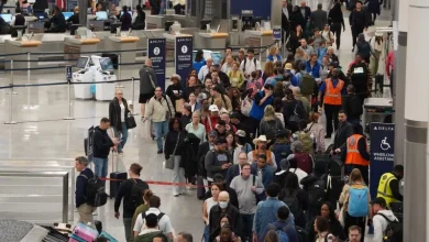 Travelers face unpredictable airport wait times as TSA officers go unpaid