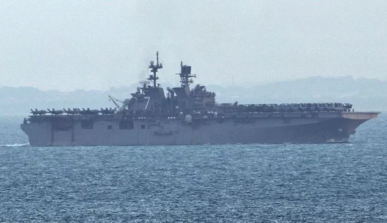 US warship believed to be carrying additional Marines to Middle East tracked off Singapore