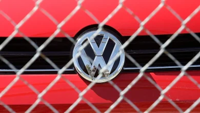 Volkswagen slashes 50,000 jobs after profits collapse by nearly half