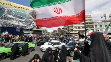 After Trump pauses war, Iranians fly flags of victory not surrender