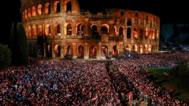 At Colosseum, pope carries the cross, leading thousands in Good Friday prayer for suffering world