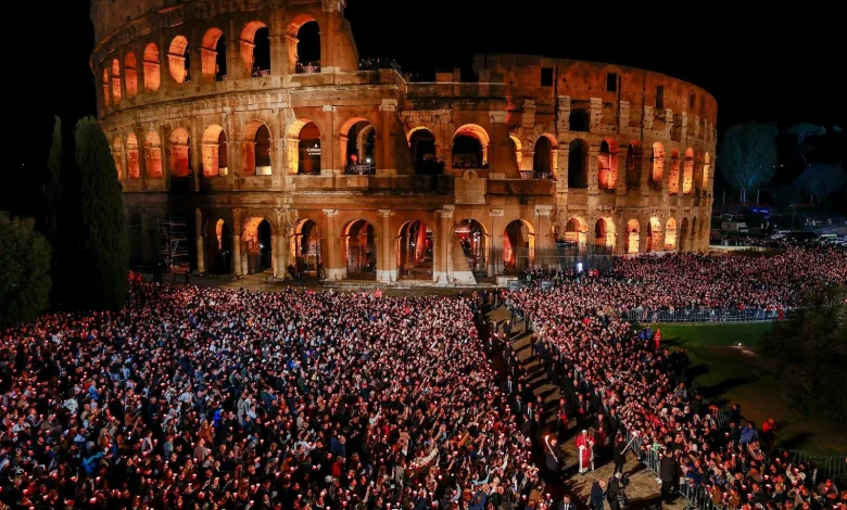 At Colosseum, pope carries the cross, leading thousands in Good Friday prayer for suffering world