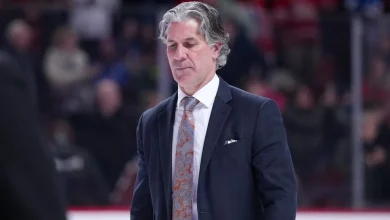 Avalanche’s Jared Bednar leaves game after taking puck to face