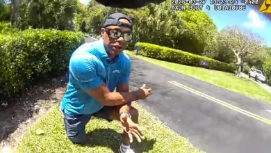 Body camera video of Tiger Woods arrest shows golfer being handcuffed after Florida crash