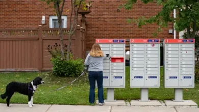 Canada Post says it will move ahead with plan to end home delivery - National