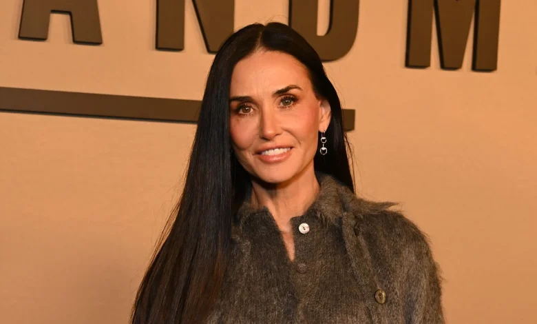 Demi Moore's straight-leg jeans, grey blazer and ankle boots combination is worth copying this spring