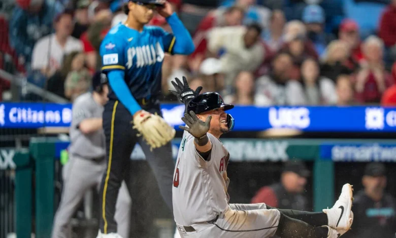 Diamondbacks mount 4-run comeback to win opener vs. Phillies