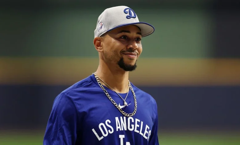 Dodgers' Mookie Betts exits in 1st inning with back pain