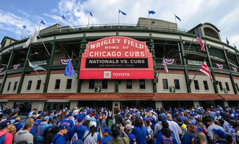 Fan spotted with laptop, apparently logging work hours from Wrigley Field stands during Cubs day game