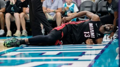 Heat's Bam Adebayo limps off after tumble with LaMelo Ball