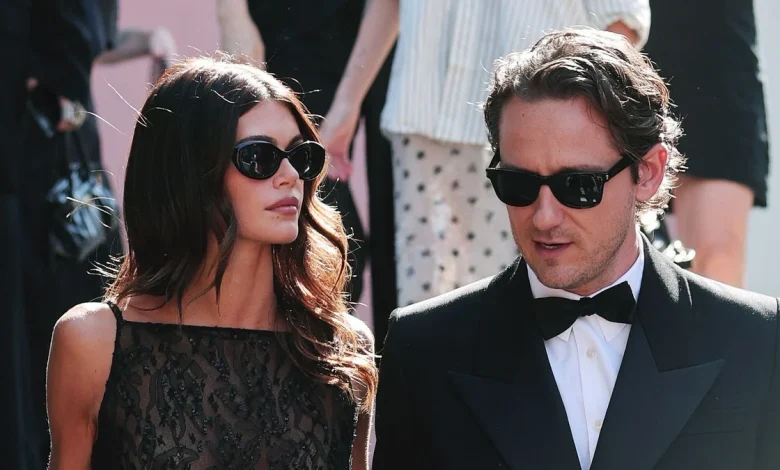 Kaia Gerber wears a tiny blue bikini as she and Lewis Pullman hit the beach in Mexico