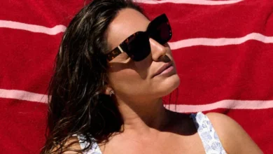 Kelly Brook’s white and blue swimsuit is a showstopper