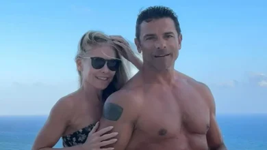 Kelly Ripa says she has a secret signal that tells Mark Consuelos she's not in the mood