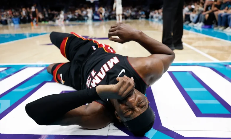 NBA play-in: Bam Adebayo leaves for locker room after LaMelo Ball grabbed his ankle on fall to ground