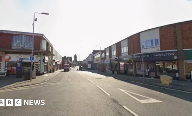 One person taken to hospital after car hits building