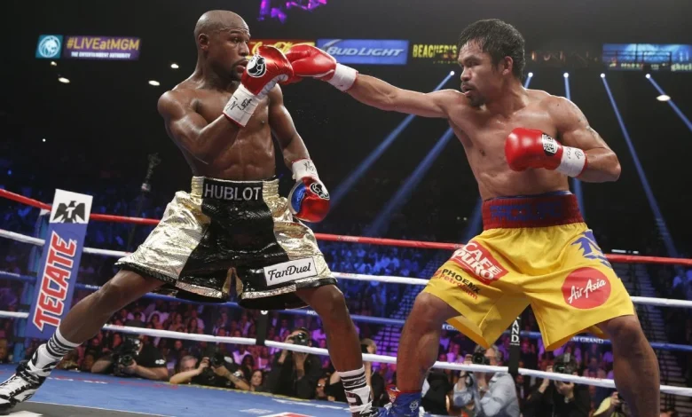 Pacquiao camp: Mayweather fight not an exhibition, 'still on'