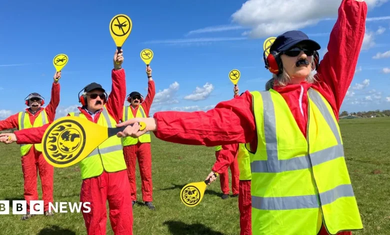 Protesters say runway extension will 'wreck' common