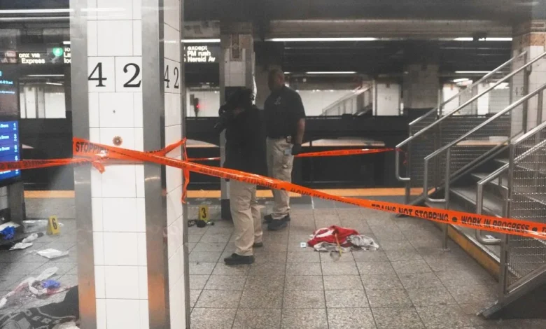 Three people found stabbed at New York subway station, man with knife shot by officers