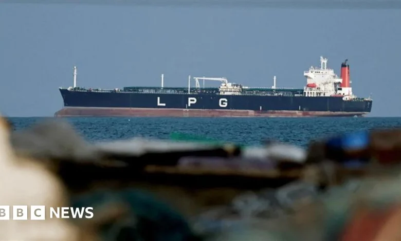 UK says Iran holding world economy 'hostage' with Hormuz attacks