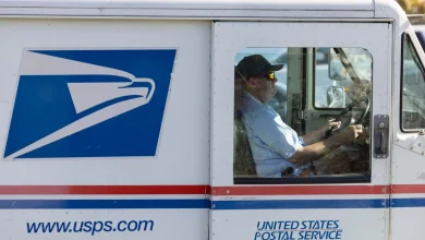 USPS suspends contributions to employee pensions after warning of "cash crisis"