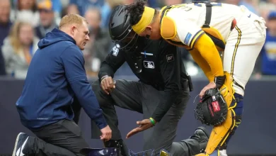 Umpire C.B. Bucknor leaves game with injury days after ABS humbled him