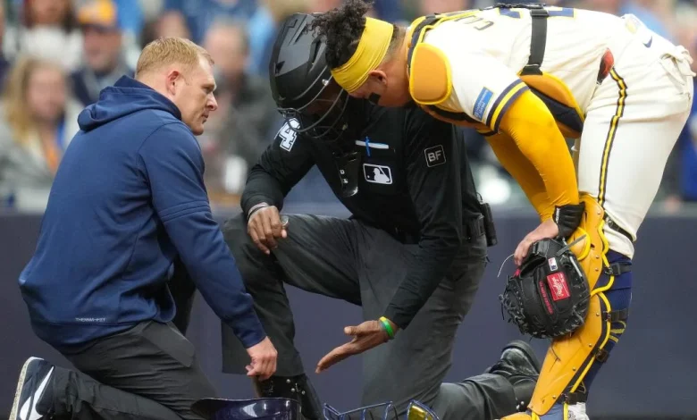 Umpire C.B. Bucknor leaves game with injury days after ABS humbled him