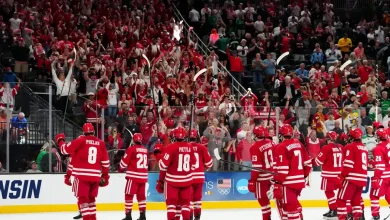 When is Wisconsin hockey playing in Frozen Four national title game?
