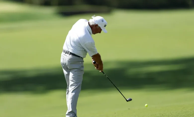 Why does Fred Couples uses a yellow ball at the Masters in 2026?