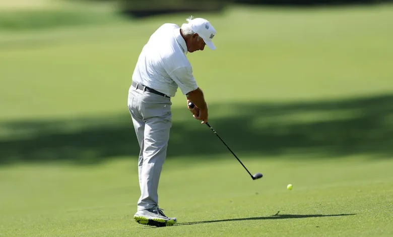 Why is Fred Couples using a yellow ball at the Masters in 2026?