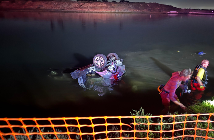 Woman killed when SUV struck by car and left upside down in Huntington Beach wetlands