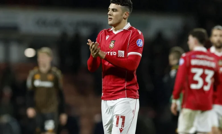 Wrexham striker one game away from qualifying for summer’s World Cup Finals