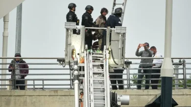 Activist ends protest atop DC bridge