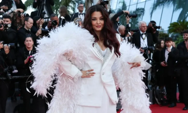 Aishwarya Rai Owns Cannes Closing In An All-White Power Suit And Feather Boa