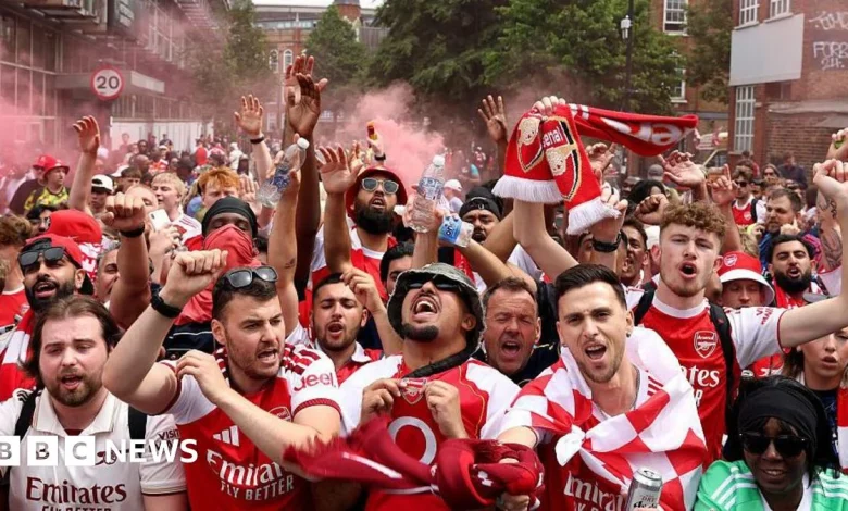 Arsenal victory parade: Thousands of fans line streets of north London
