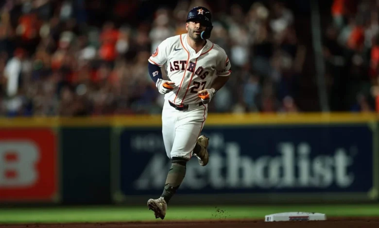 Astros’ Jose Altuve exits game after grabbing side on awkward swing