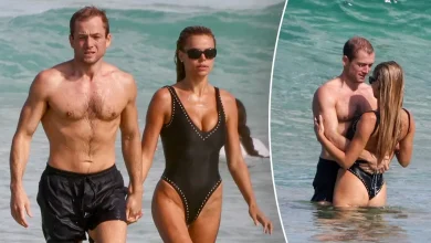 Brooks Nader flaunts plunging swimsuit during steamy beach date with actor Taron Egerton in Australia