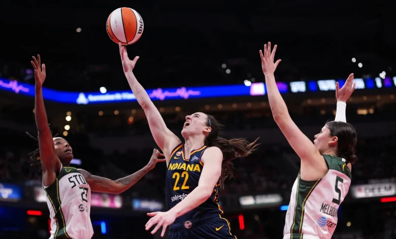 Caitlin Clark has 21 points with 10 assists to lead Fever to 89-78 win over Storm