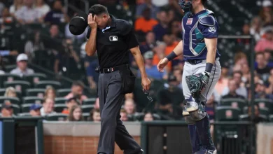 Cal Raleigh exits with injury in Mariners 4-3 loss to Astros in extras