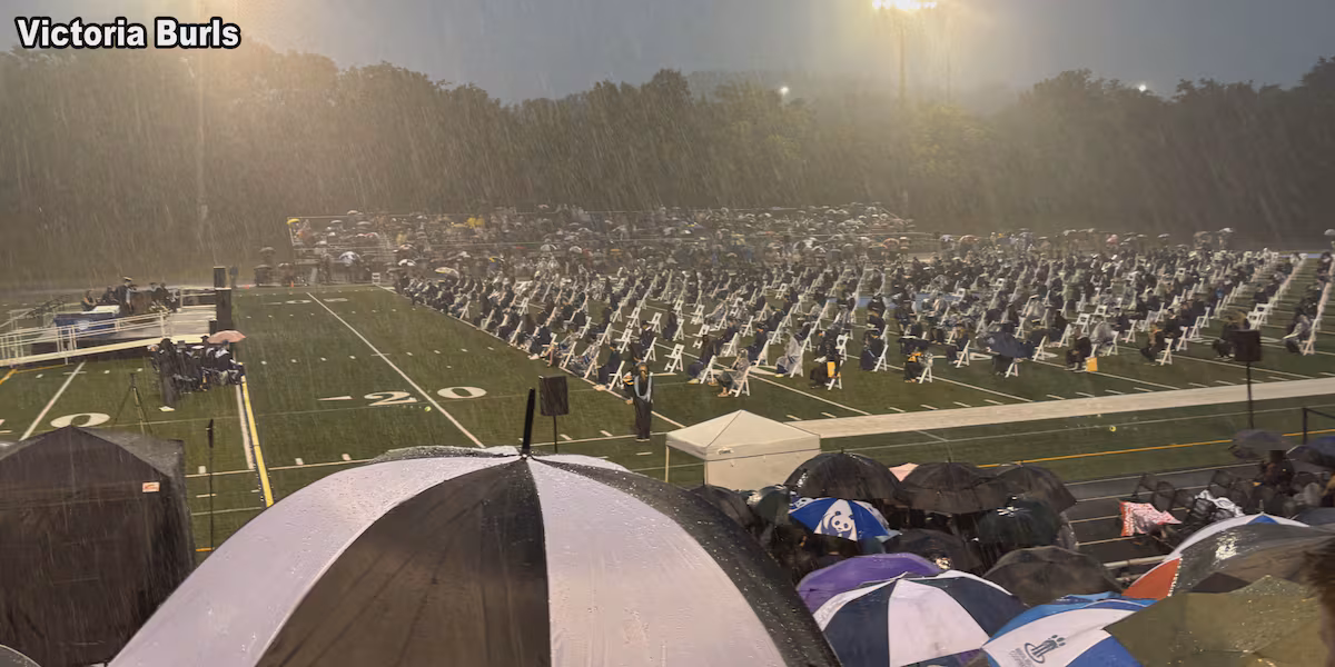 Centennial, Franklin high schools hold graduations in torrential downpour