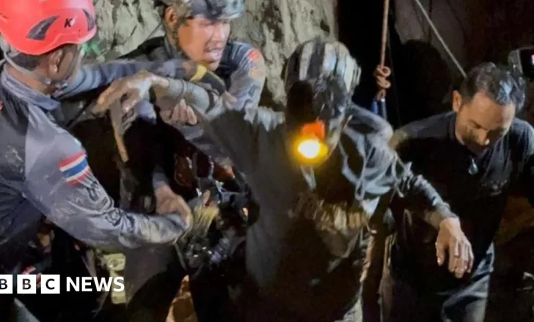 First of five men found alive in flooded Laos cave rescued