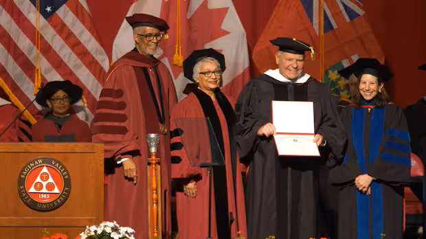 Ford receives honorary doctorate degree, quotes Reagan in U.S. university grad speech
